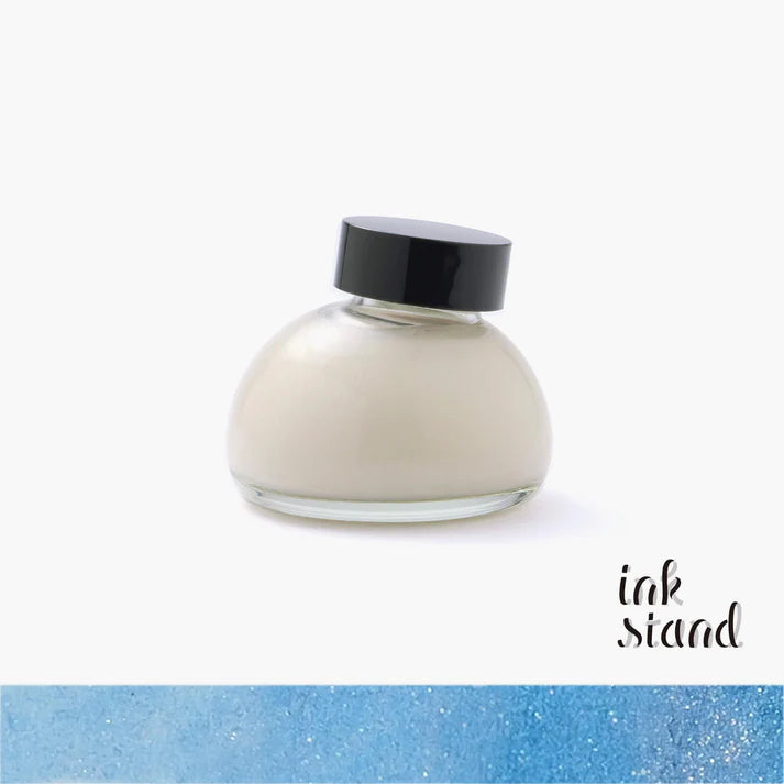 Solution nacrée pour encre