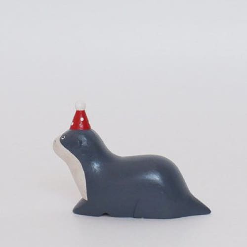 Figurine en bois - Loutre avec chapeau de fête - FIGURINES EN BOIS