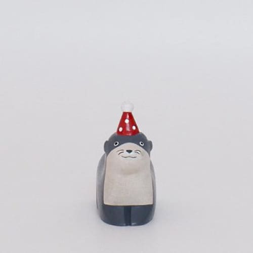 Figurine en bois - Loutre avec chapeau de fête - FIGURINES EN BOIS